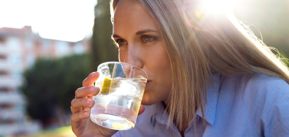 Beautiful young woman drinking soda in a restaurant terrace. Beautiful young woman drinking soda in a restaurant terrace.